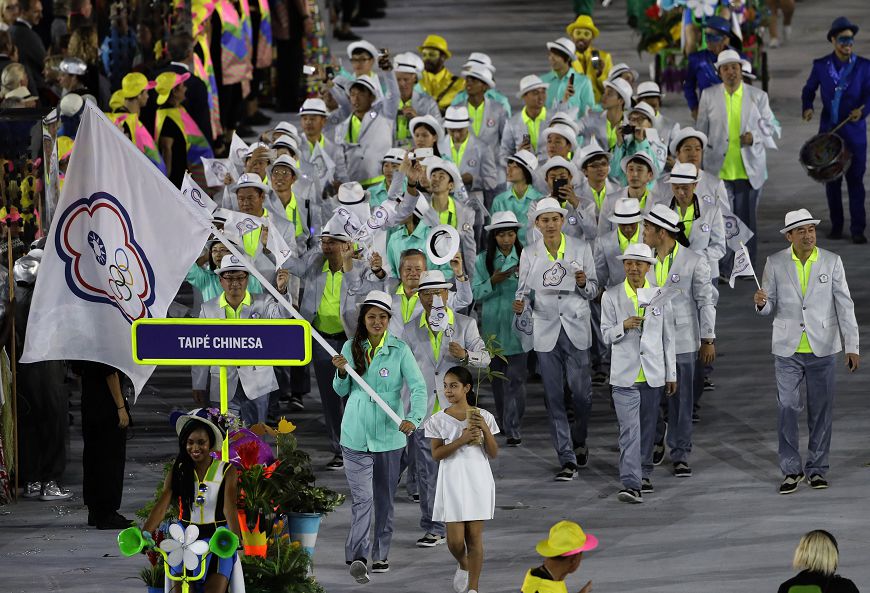 Isheau Wong carries the flag of Taiwan during the opening ceremony for the 2016 Summer Olympics in Rio de Janeiro, Brazil, Friday, Aug. 5, 2016. (AP Photo/Matt Slocum)