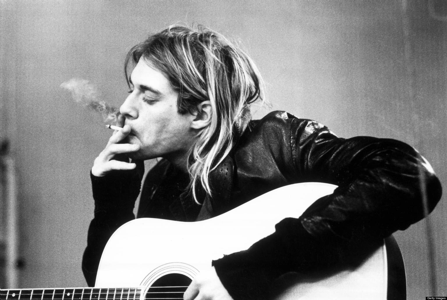 NETHERLANDS - NOVEMBER 25: HILVERSUM Photo of Kurt COBAIN and NIRVANA, Kurt Cobain recording in Hilversum Studios smoking cigarette (Photo by Michel Linssen/Redferns)