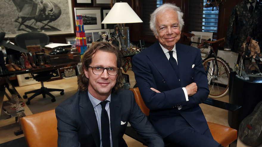 Designer Ralph Lauren, right, poses in his office with Stefan Larsson, global brand president for Old Navy, Tuesday, Sept. 29, 2015, in New York. Lauren is stepping down as CEO of the fashion and home decor empire that he founded nearly 50 years ago, and Larsson, who has been the global president of Gap's low-price Old Navy chain for three years, will succeed him. (AP Photo/Jason DeCrow)
